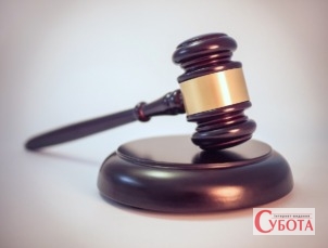 Суддівський молоток як ілюстрація до вироку Малинського районного суду