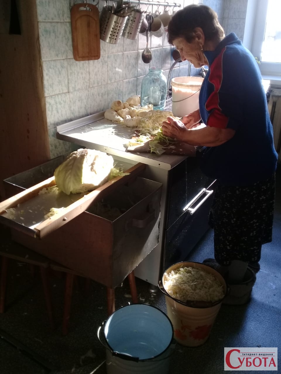Preparing homemade sauerkraut by hand