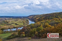 River and forest in the fall Ukrainian landscape